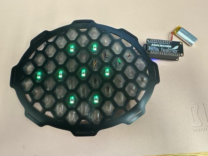 WDOTIS honeycomb wearable with illuminated optical sensors